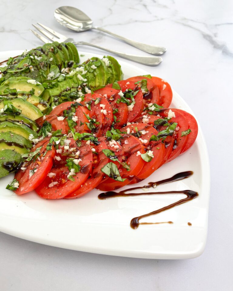 Simple and fresh side dish with avocado and tomatoes (plant-based)